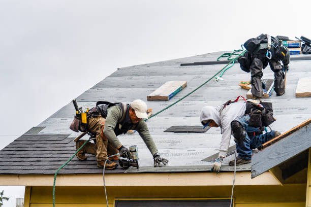 Professional Gutter Installation technician working in Swan Lake, NY